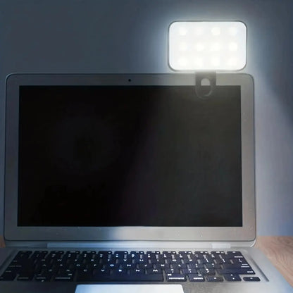 Clip-on LED light on a laptop